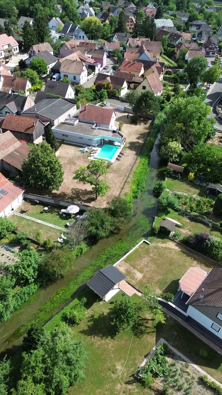 Aerial view — Alsace · the estate and its river